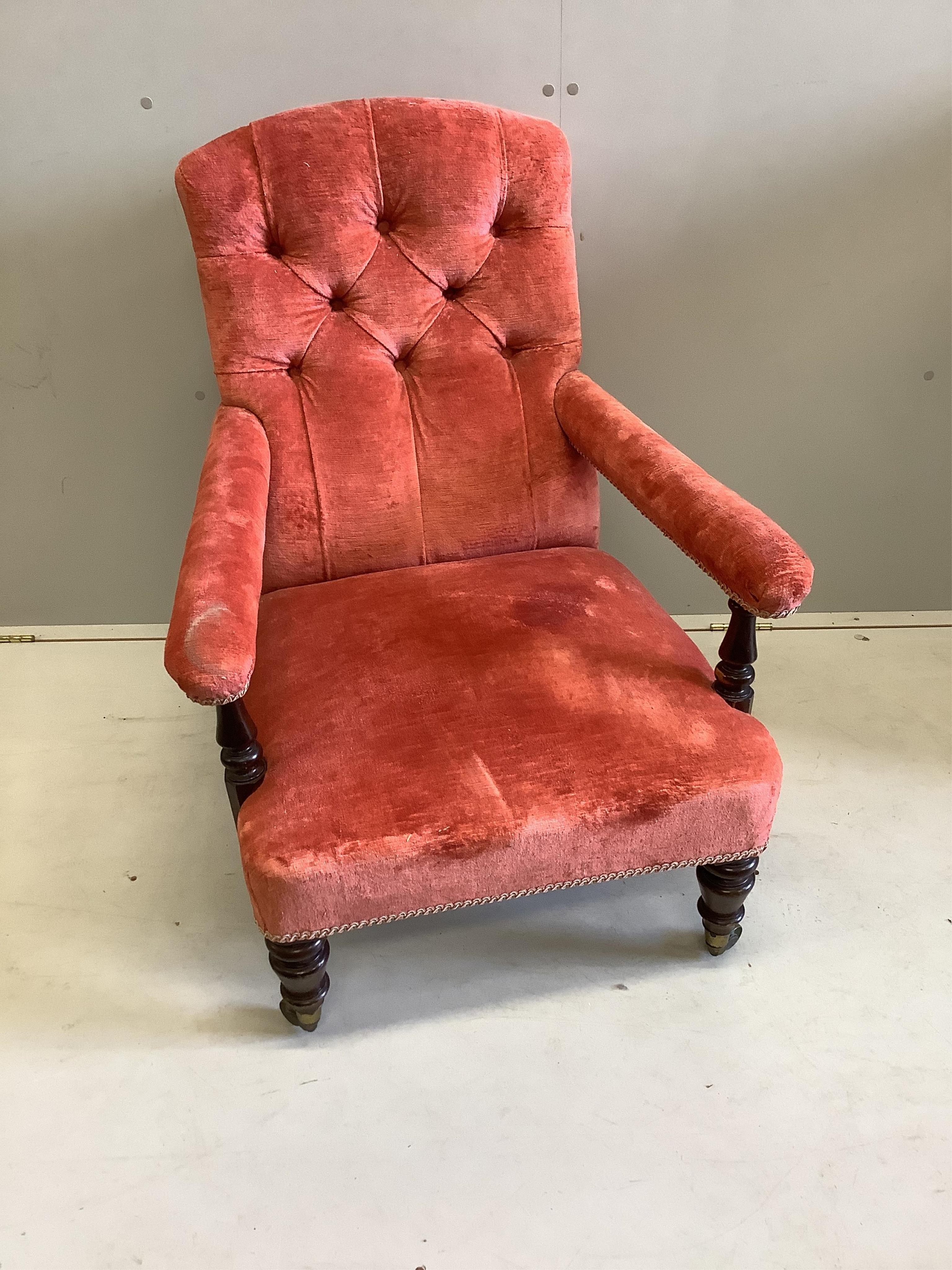 A Victorian upholstered open armchair, width 64cm, depth 84cm, height 88cm